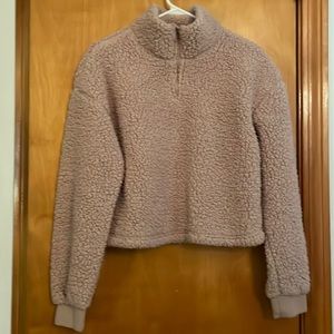 Mauve furry pullover with stand up collar